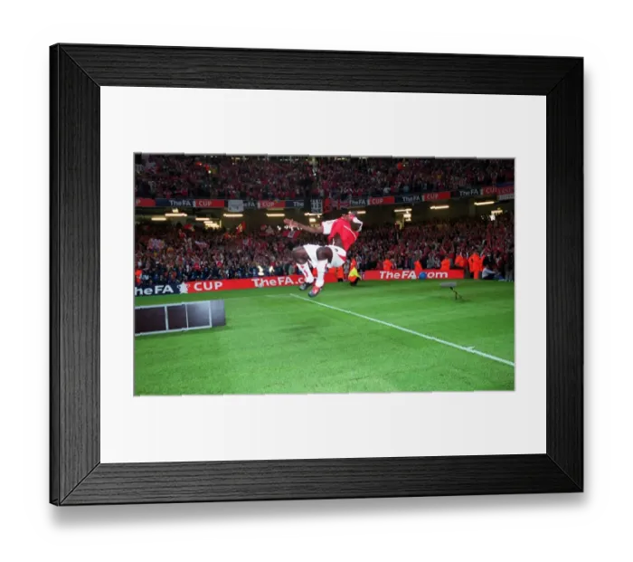 Framed Print : Arsenal's FA Cup Triumph: Kolo Toure's Euphoric Backflip, Millennium Stadium, 2003
