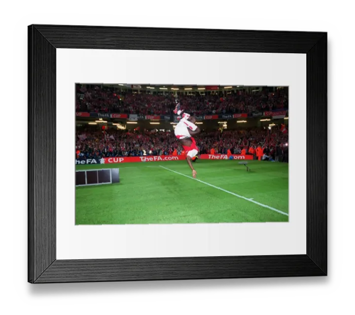 Framed Print : Arsenal's FA Cup Victory: Kolo Toure's Euphoric Backflip at the Millennium Stadium, 2003