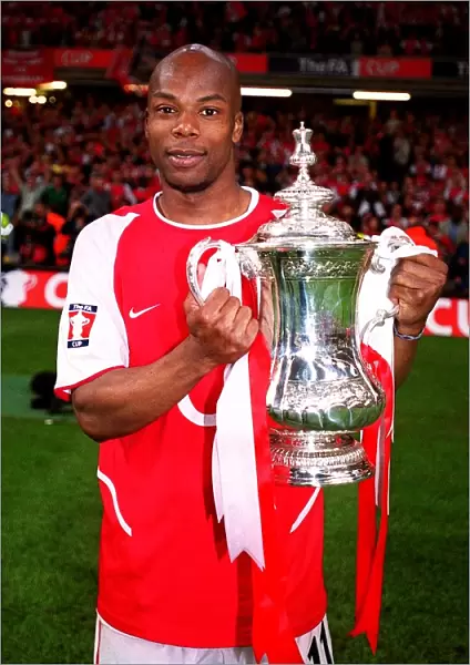Sylvain Wiltord Lifts the FA Cup: Arsenal's Victory over Southampton (1-0), The Millennium Stadium, Cardiff, Wales, May 2003
