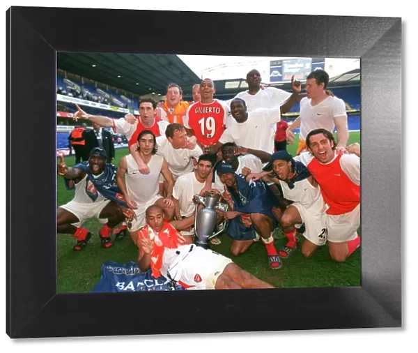 The Arsenal players celebrate winning the league. Tottenham Hotspur v Arsenal