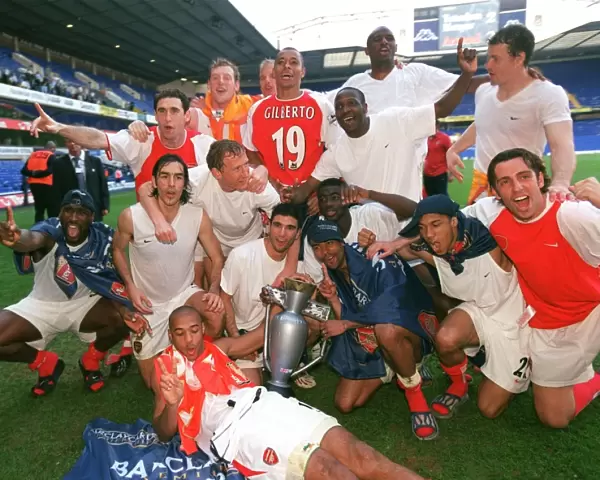 The Arsenal players celebrate winning the league. Tottenham Hotspur v Arsenal