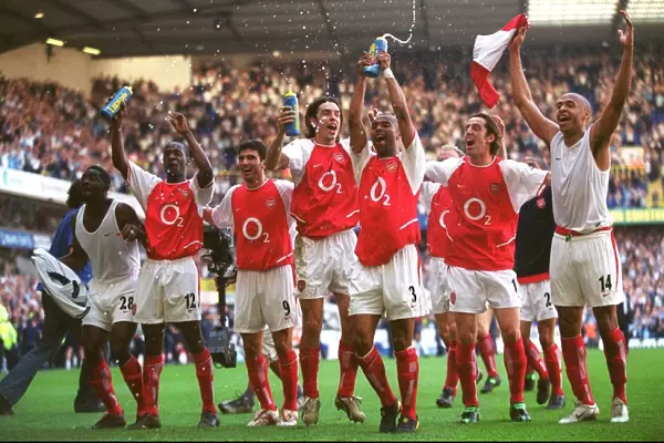 Arsenal's Glory: Celebrating Victory Over Tottenham at White Hart Lane, 2004