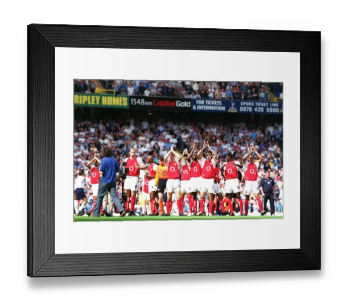 Framed Print : The Arsenal players clap the fans before the match. Tottenham Hotspur v Arsenal Framed Print : The Arsenal players clap the fans before the match. Tottenham Hotspur v Arsenal