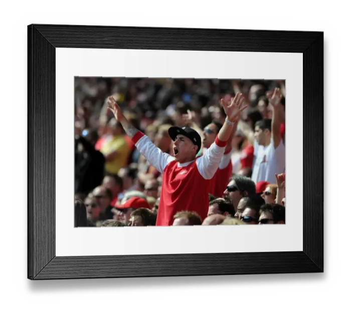 Framed Print : Arsenal fan. Arsenal 1: 0 Manchester United. Barclays Premier League. Emirates Stadium