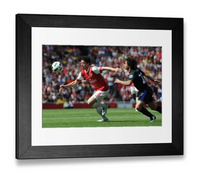 Framed Print : Samir Nasri (Arsenal) Fabio (Man Utd). Arsenal 1: 0 Manchester United. Barclays Premier League