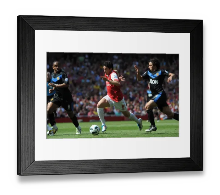 Framed Print : Samir Nasri (Arsenal) Fabio and Anderson (Man Utd). Arsenal 1: 0 Manchester United Framed Print : Samir Nasri (Arsenal) Fabio and Anderson (Man Utd). Arsenal 1: 0 Manchester United