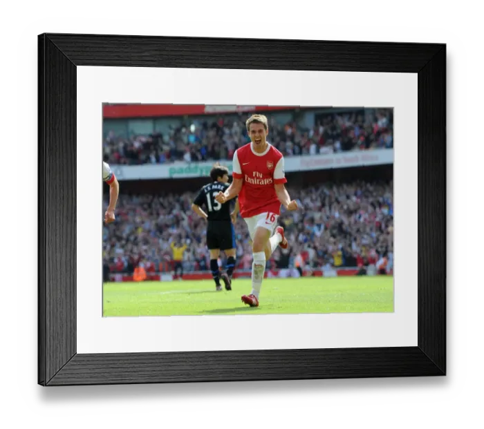 Framed Print : Unstoppable Partnership: Ramsey and van Persie's Goal Celebration - Arsenal's 1:0 Victory Over Manchester United Framed Print : Unstoppable Partnership: Ramsey and van Persie's Goal Celebration - Arsenal's 1:0 Victory Over Manchester United