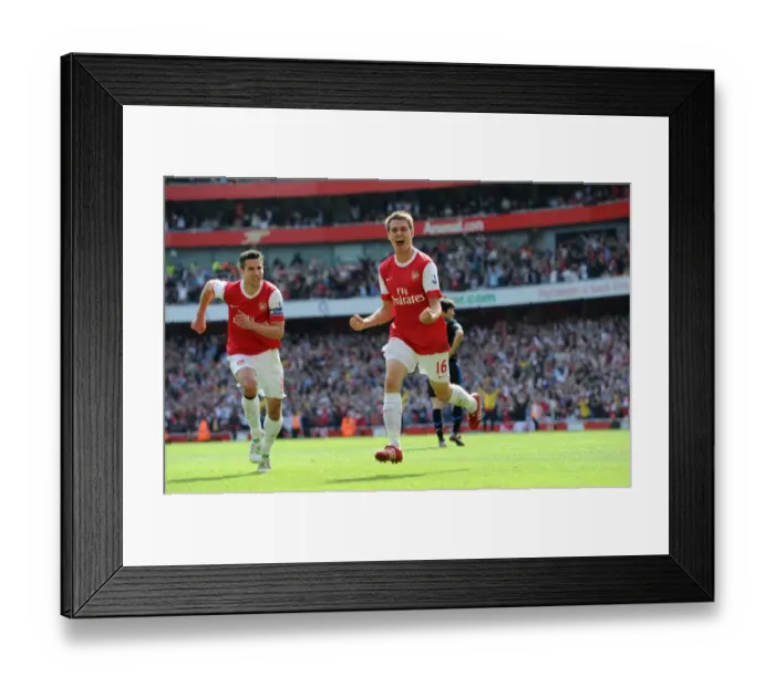 Framed Print : Unstoppable Arsenal: Ramsey and van Persie's 1:0 Victory Over Manchester United Framed Print : Unstoppable Arsenal: Ramsey and van Persie's 1:0 Victory Over Manchester United