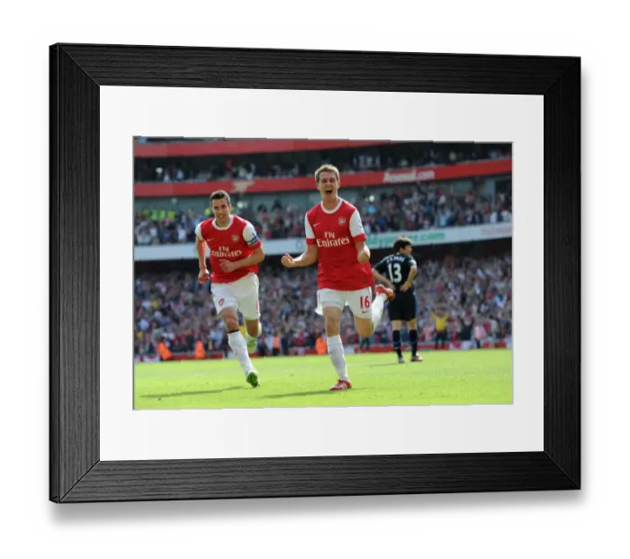Framed Print : Ramsey and van Persie: Unforgettable Goal Celebration as Arsenal Defeats Manchester United 1-0 in Premier League Framed Print : Ramsey and van Persie: Unforgettable Goal Celebration as Arsenal Defeats Manchester United 1-0 in Premier League