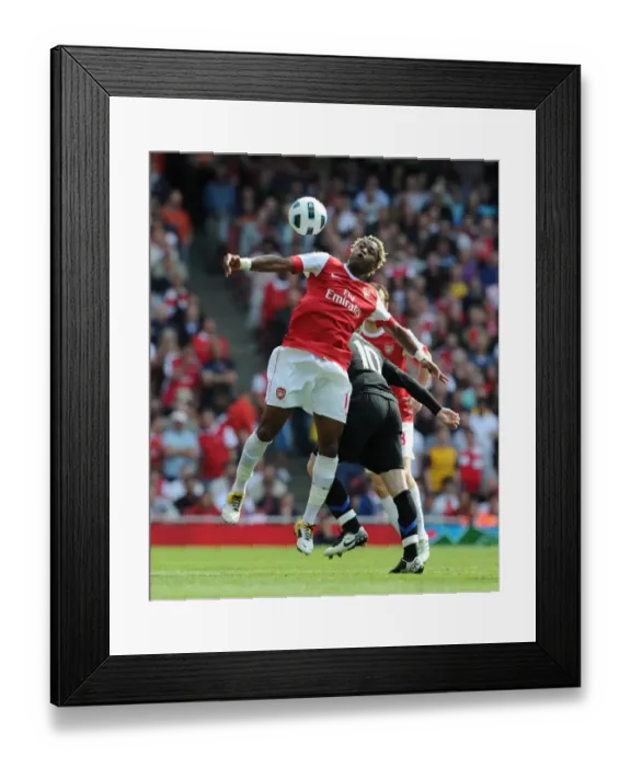 Framed Print : Alex Song (Arsenal) Wayne Rooney (Man Utd). Arsenal 1: 0 Manchester United