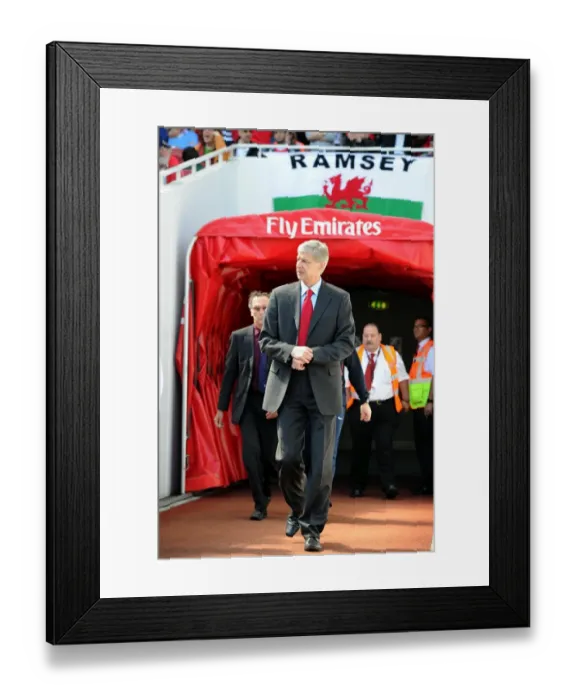 Framed Print : Arsene Wenger the Arsenal Manager walks out of the tunnell before the match