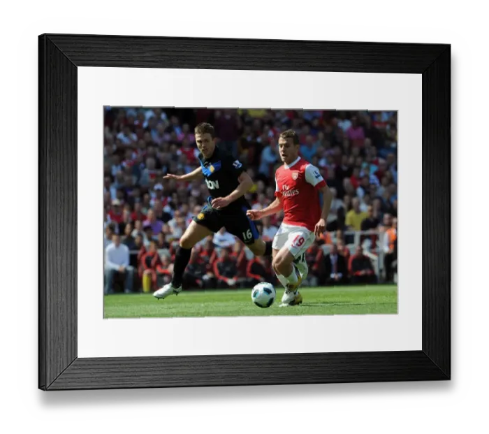 Framed Print : Jack Wilshere (Arsenal) Michael Carrick (Man Utd). Arsenal 1: 0 Manchester United Framed Print : Jack Wilshere (Arsenal) Michael Carrick (Man Utd). Arsenal 1: 0 Manchester United