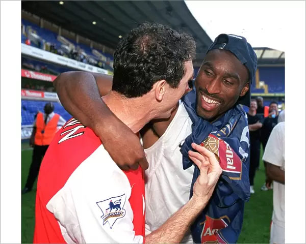Martin Keown and Sol Campbell (Arsenal) celebrate winning the league