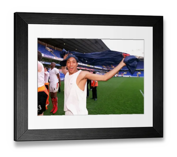Framed Print : Gael Clichy (Arsenal) celebrates winning the league