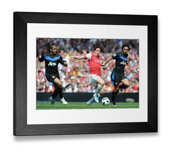 Framed Print : Samir Nasri (Arsenal) Fabio and Anderson (Man United). Arsenal 1: 0 Manchester United Framed Print : Samir Nasri (Arsenal) Fabio and Anderson (Man United). Arsenal 1: 0 Manchester United