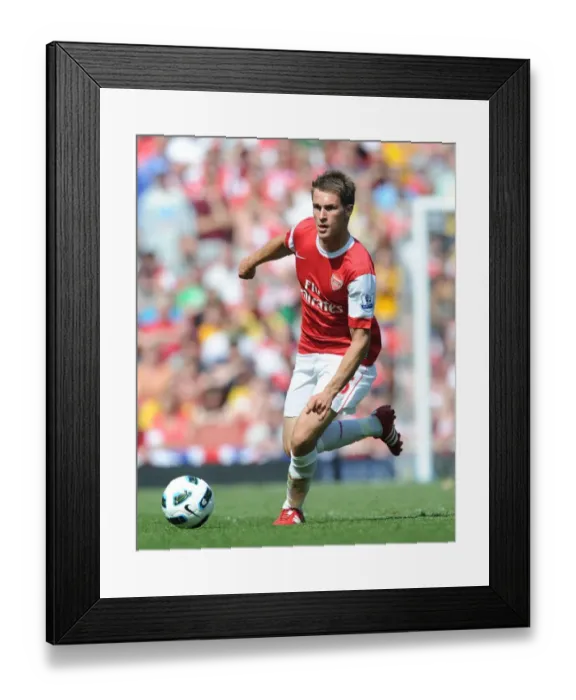 Framed Print : Ramsey's Stunner: Arsenal Edge Manchester United 1-0 in Premier League Thriller