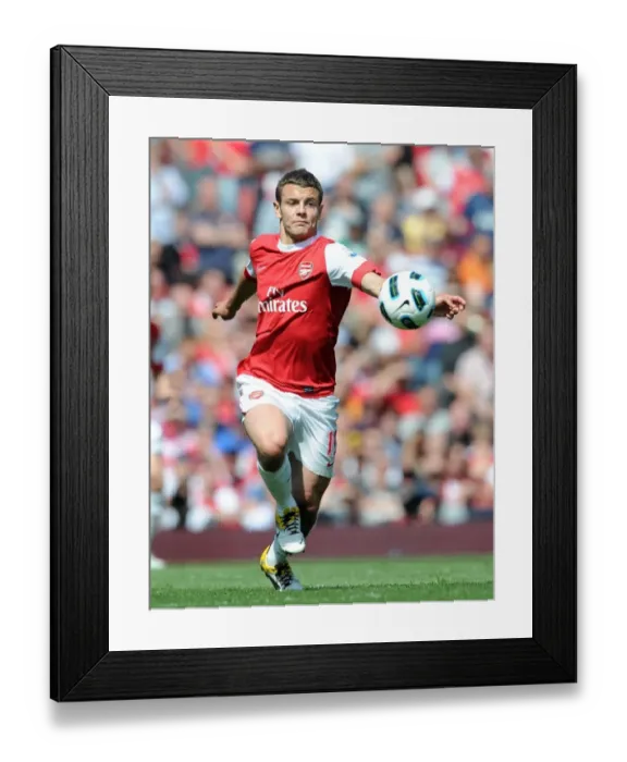 Framed Print : Arsenal's Jack Wilshere Scores the Winning Goal Against Manchester United in the Barclays Premier League Framed Print : Arsenal's Jack Wilshere Scores the Winning Goal Against Manchester United in the Barclays Premier League