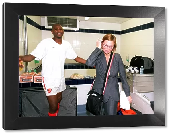 Amanda Docherty and Patrick Vieira celebrate at the end of the match