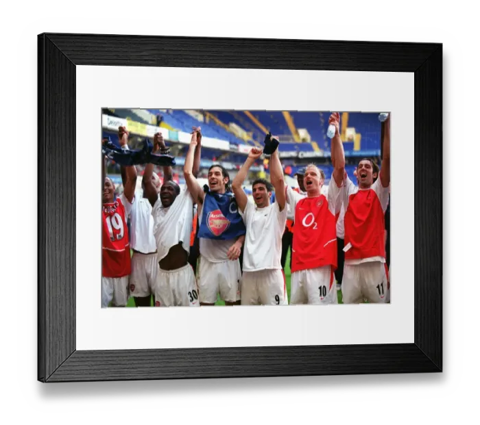 Framed Print : The Arsenal players celebrate Arsenal;s win in the photographers room (L>R) Gilberto Framed Print : The Arsenal players celebrate Arsenal;s win in the photographers room (L>R) Gilberto