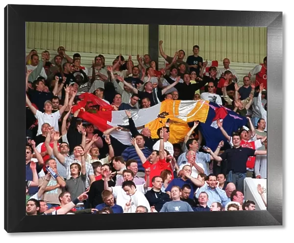 Arsenal's Victory: Fans Celebrate at White Hart Lane, 2004