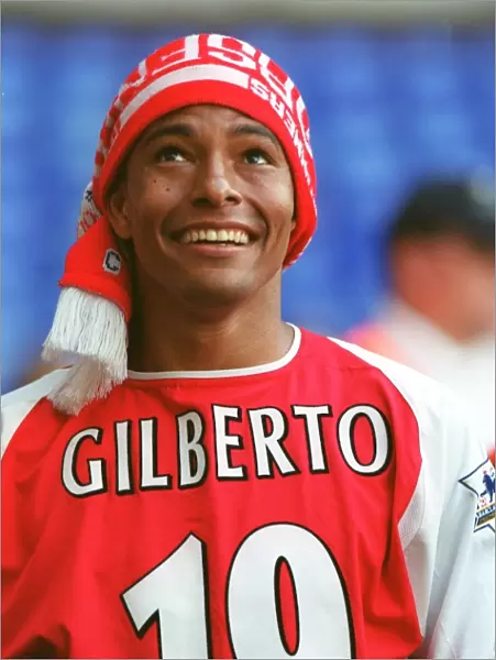 Gilberto's Glory: Arsenal Celebrates Premier League Victory at White Hart Lane