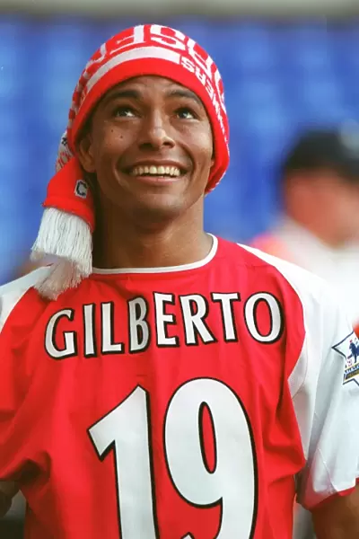 Gilberto's Glory: Arsenal Celebrates Premier League Victory at White Hart Lane