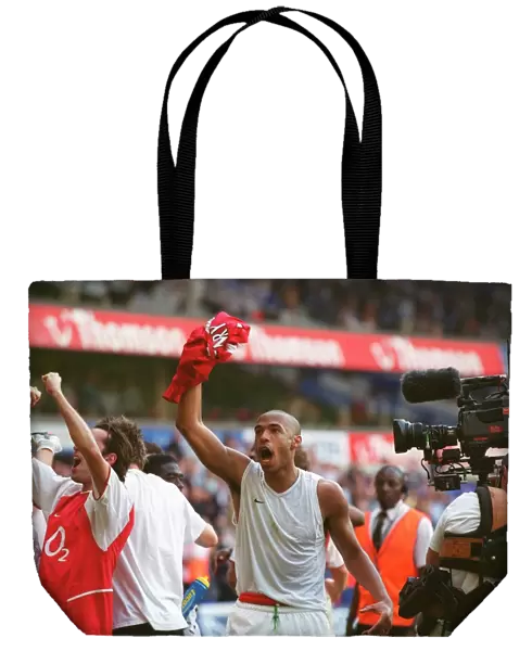 Thierry Henry's Euphoric Celebration: Arsenal Clinch the Premier League Title at White Hart Lane (2004)
