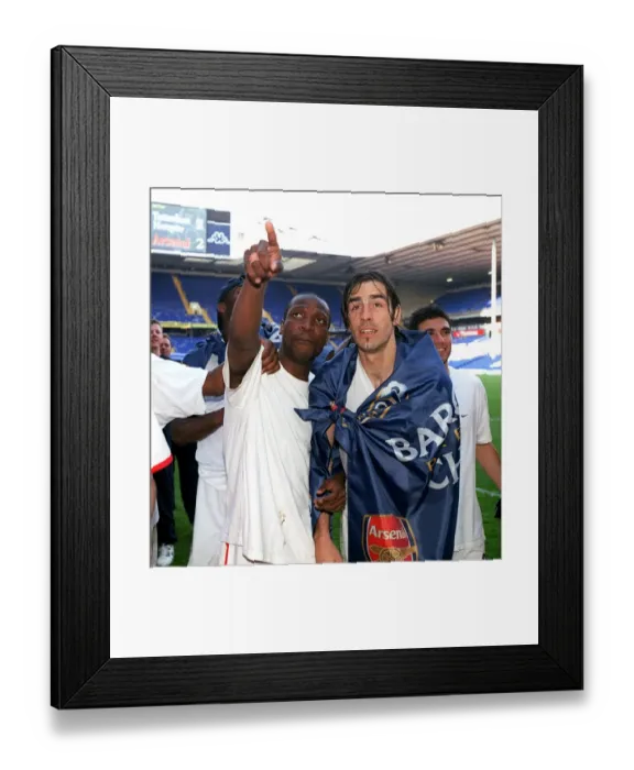 Framed Print : Lauren and Robert Pires (Arsenal) celebrate winning the league Framed Print : Lauren and Robert Pires (Arsenal) celebrate winning the league