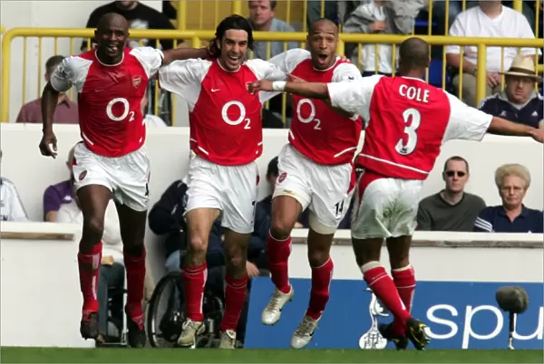 Pires and Vieira: Unstoppable Duo Celebrate Arsenal's Victory Goals vs. Tottenham, FA Premiership 2003-04