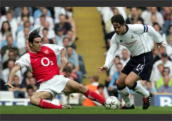 Robert Pires (Arsenal) Jamie Redknapp (Tottenham). Tottenham Hotspur v Arsenal