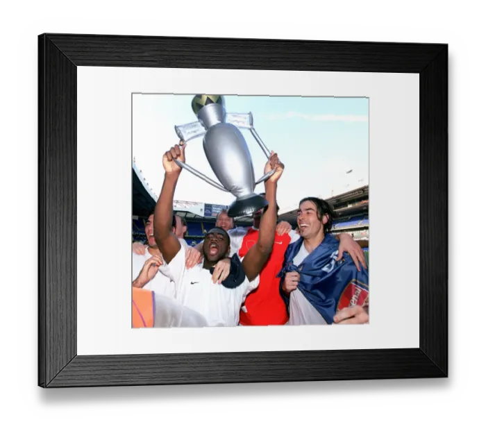 Framed Print : Kolo Toure and Robert Pires (Arsenal) celebrate winning the League Framed Print : Kolo Toure and Robert Pires (Arsenal) celebrate winning the League