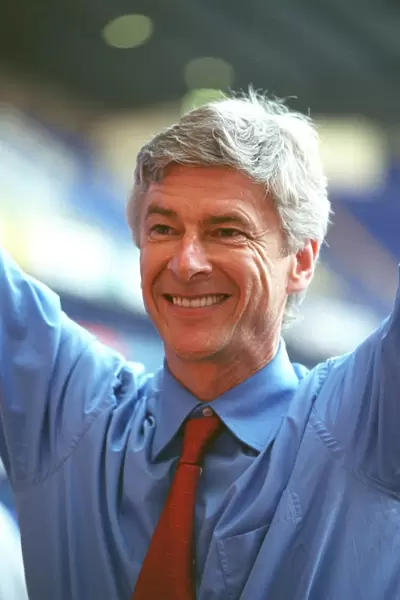 Arsene Wenger the Arsenal Manager celebrates winning the league
