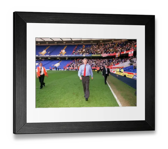 Framed Print : Arsene Wenger the Arsenal manager celebrates at the end of the match Framed Print : Arsene Wenger the Arsenal manager celebrates at the end of the match