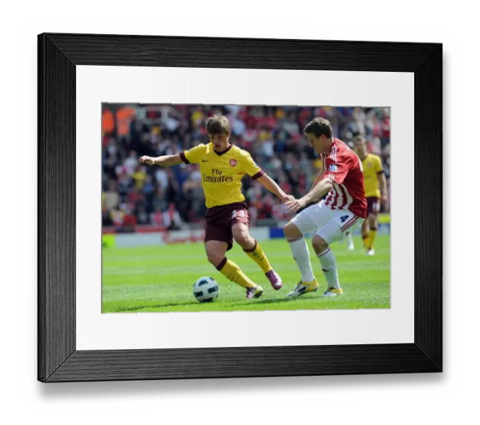 Framed Print : Andrey Arshavin (Arsenal) Robert Huth (Stoke). Stoke City 3: 1 Arsenal. Barclays Premier League Framed Print : Andrey Arshavin (Arsenal) Robert Huth (Stoke). Stoke City 3: 1 Arsenal. Barclays Premier League