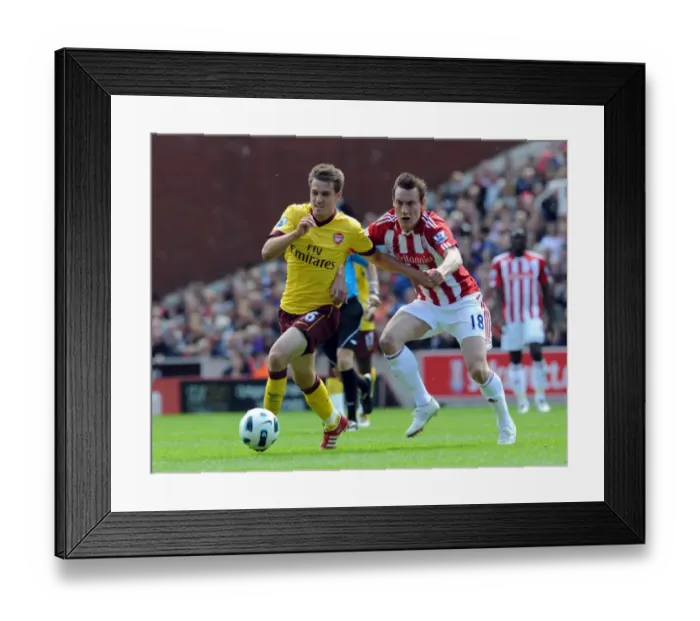 Framed Print : Ramsey vs Whitehead: Stoke's Surprise 3-1 Victory over Arsenal in Premier League, 2011 Framed Print : Ramsey vs Whitehead: Stoke's Surprise 3-1 Victory over Arsenal in Premier League, 2011