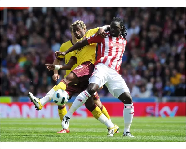 Alex Song (Arsenal) Kenwyne Jones (Stoke). Stoke City 3: 1 Arsenal, Barclays Premier League