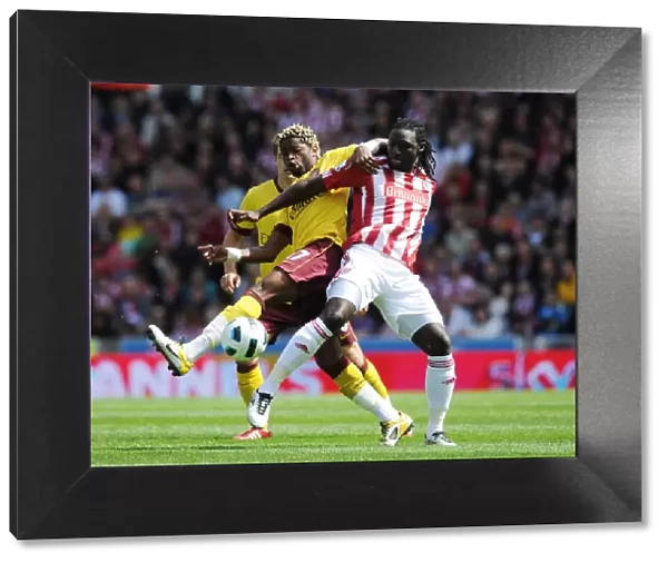 Alex Song (Arsenal) Kenwyne Jones (Stoke). Stoke City 3: 1 Arsenal, Barclays Premier League