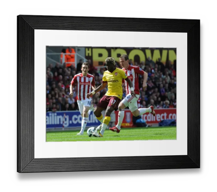 Framed Print : Song vs. Whelan: Stoke's Surprise 3-1 Victory Over Arsenal in Premier League, 2011
