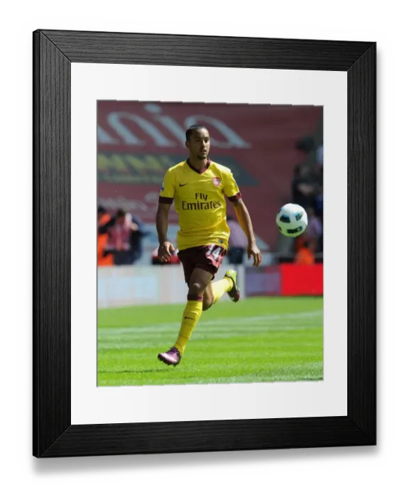 Framed Print : Theo Walcott (Arsenal). Stoke City 3: 1 Arsenal. Barclays Premier League Framed Print : Theo Walcott (Arsenal). Stoke City 3: 1 Arsenal. Barclays Premier League