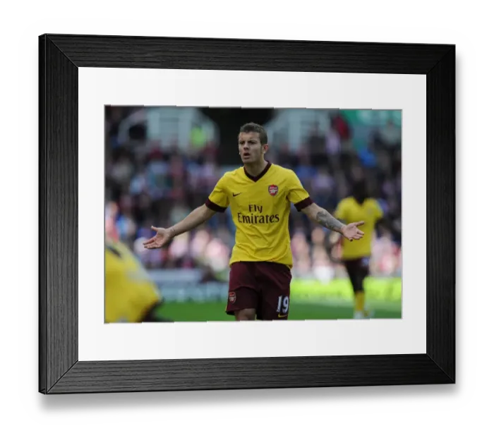 Framed Print : Jack Wilshere's Struggle: Stoke City's 3-1 Victory Over Arsenal, Premier League 2011 Framed Print : Jack Wilshere's Struggle: Stoke City's 3-1 Victory Over Arsenal, Premier League 2011