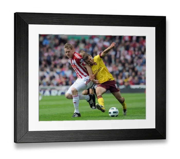 Framed Print : Jack Wilshere vs. Ryan Shawcross: Stoke City's Triumph Over Arsenal in the Barclays Premier League (8 / 5 / 11)
