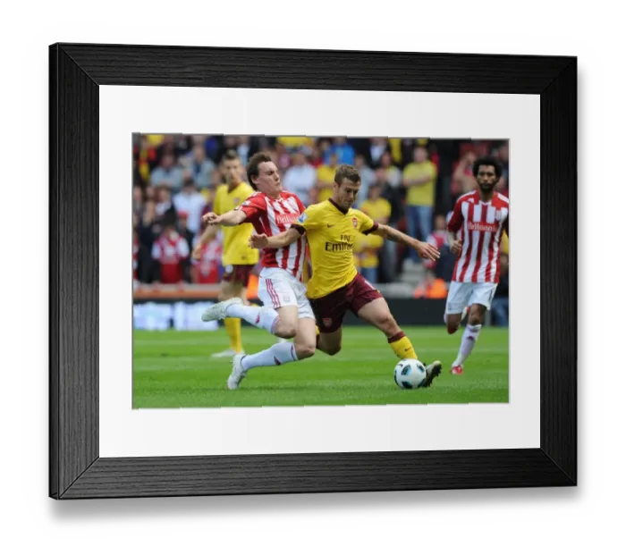 Framed Print : Jack Wilshere vs. Dean Whitehead: Stoke City's Triumph Over Arsenal (3-1)