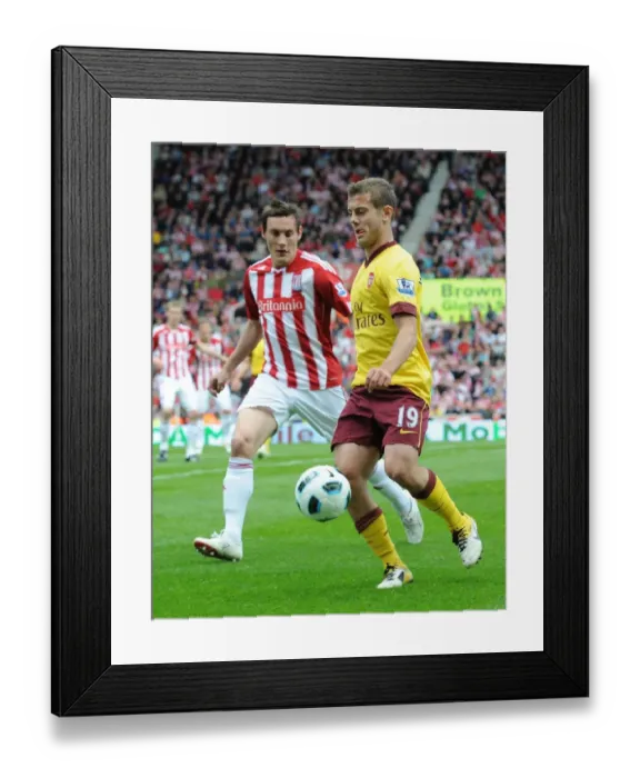 Framed Print : Stoke City's Surprise Victory: Jack Wilshere vs. Dean Whitehead (3-1) Framed Print : Stoke City's Surprise Victory: Jack Wilshere vs. Dean Whitehead (3-1)