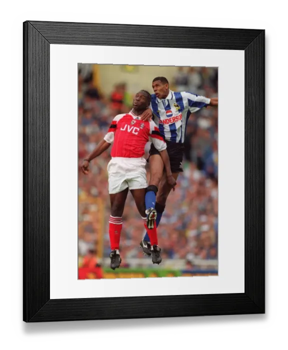 Framed Print : Kevin Campbell (Arsenal) and Carlton Palmer (Sheffield Wednesday) Framed Print : Kevin Campbell (Arsenal) and Carlton Palmer (Sheffield Wednesday)