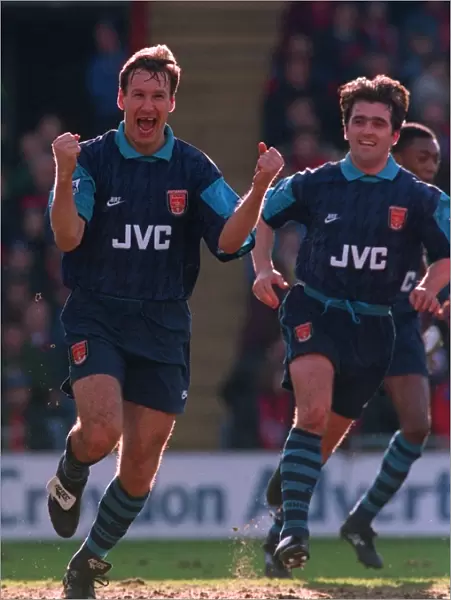 Paul Merson celebrates scoring a goal for Arsenal with Eddie McGoldrick
