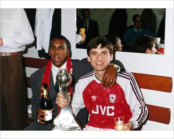 David Rocastle and Alan Smith celebrate winning the League Championship