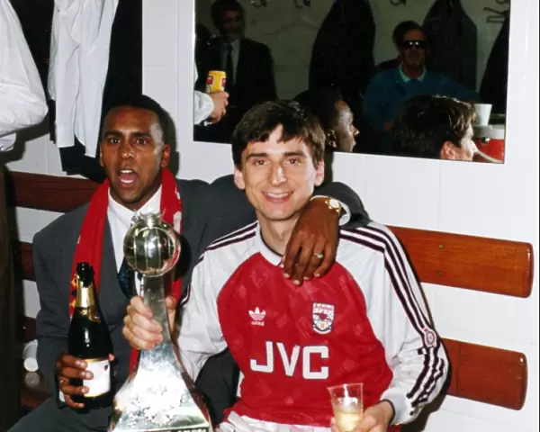 David Rocastle and Alan Smith celebrate winning the League Championship