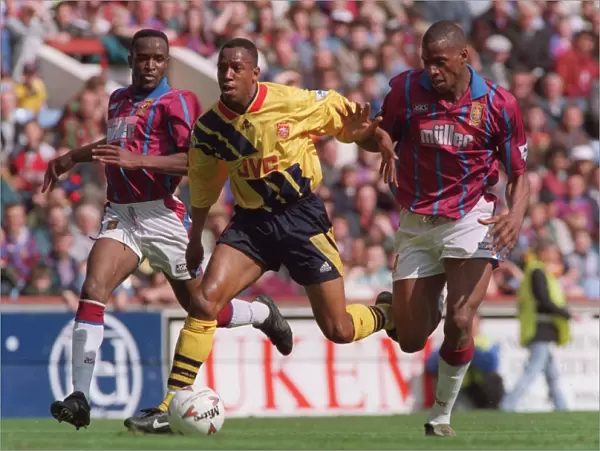 Ian Wright (Arsenal) and Earl Barrett and Ugo Ehiogu (Aston Villa)