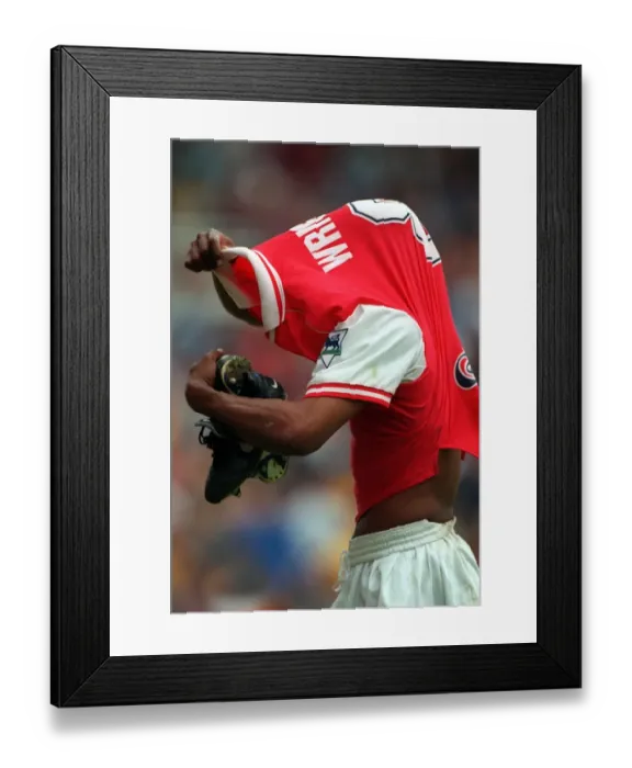 Framed Print : Ian Wright (Arsenal) takes off his shirt