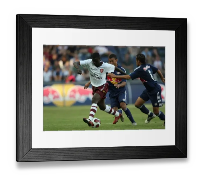 Framed Print : Eboue Face-off: Arsenal's Emmanuel vs. Salzburg's Alex in 2007 Pre-Season Clash